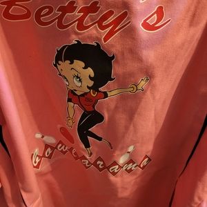 Button up short sleeved Betty Boop shirt.